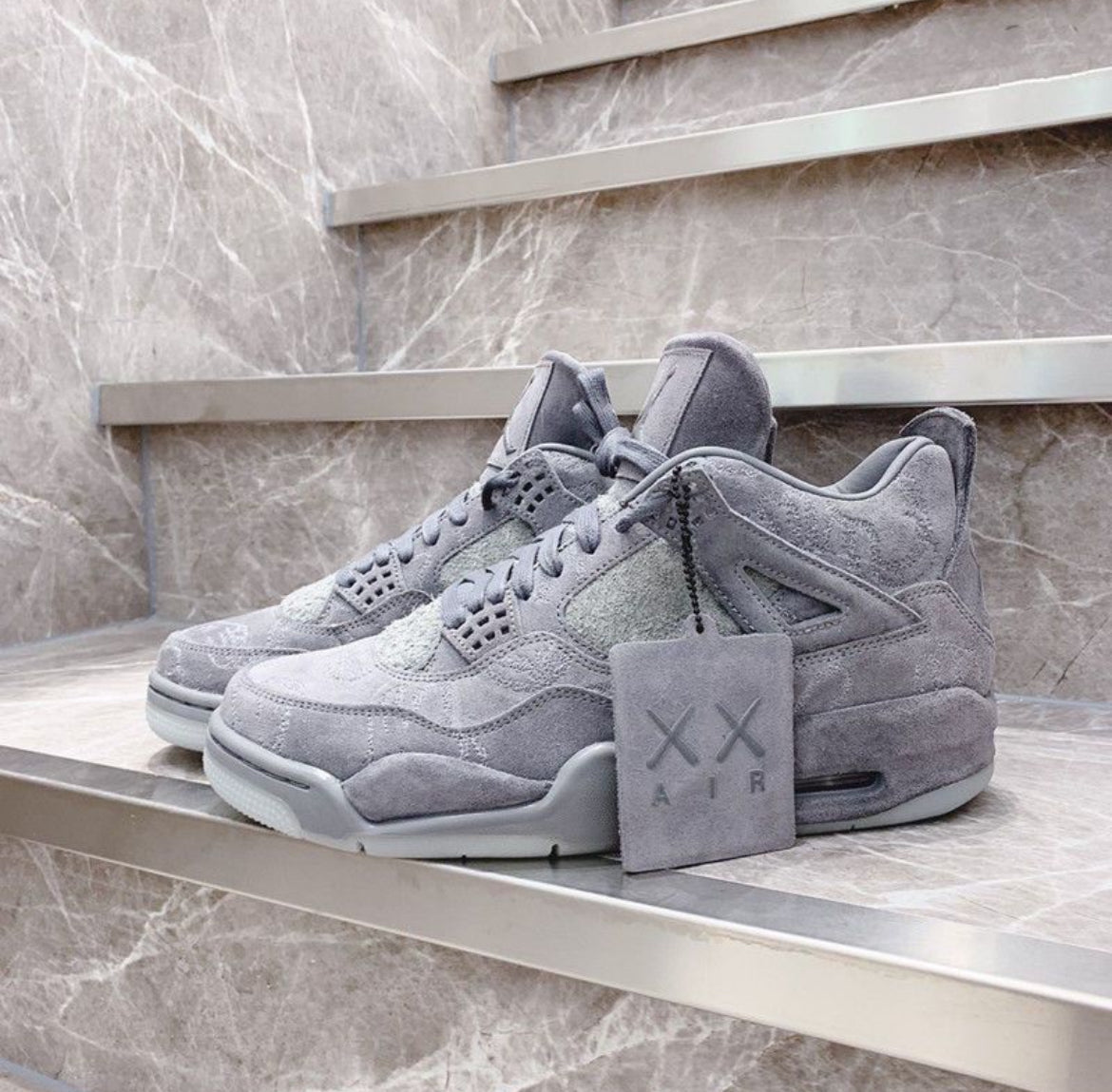 Air Jordan 4 Retro x KAWS "Cool Grey" – Art Meets Hype - Mldripanddrop